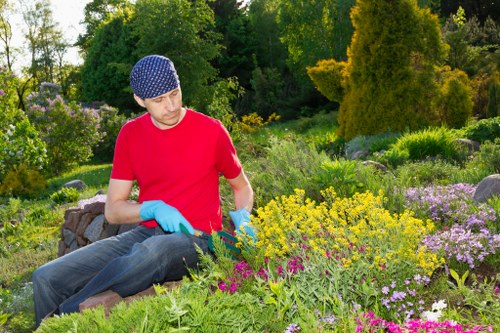 Garden maintenance team in Wormwood Scrubs working on landscaping details